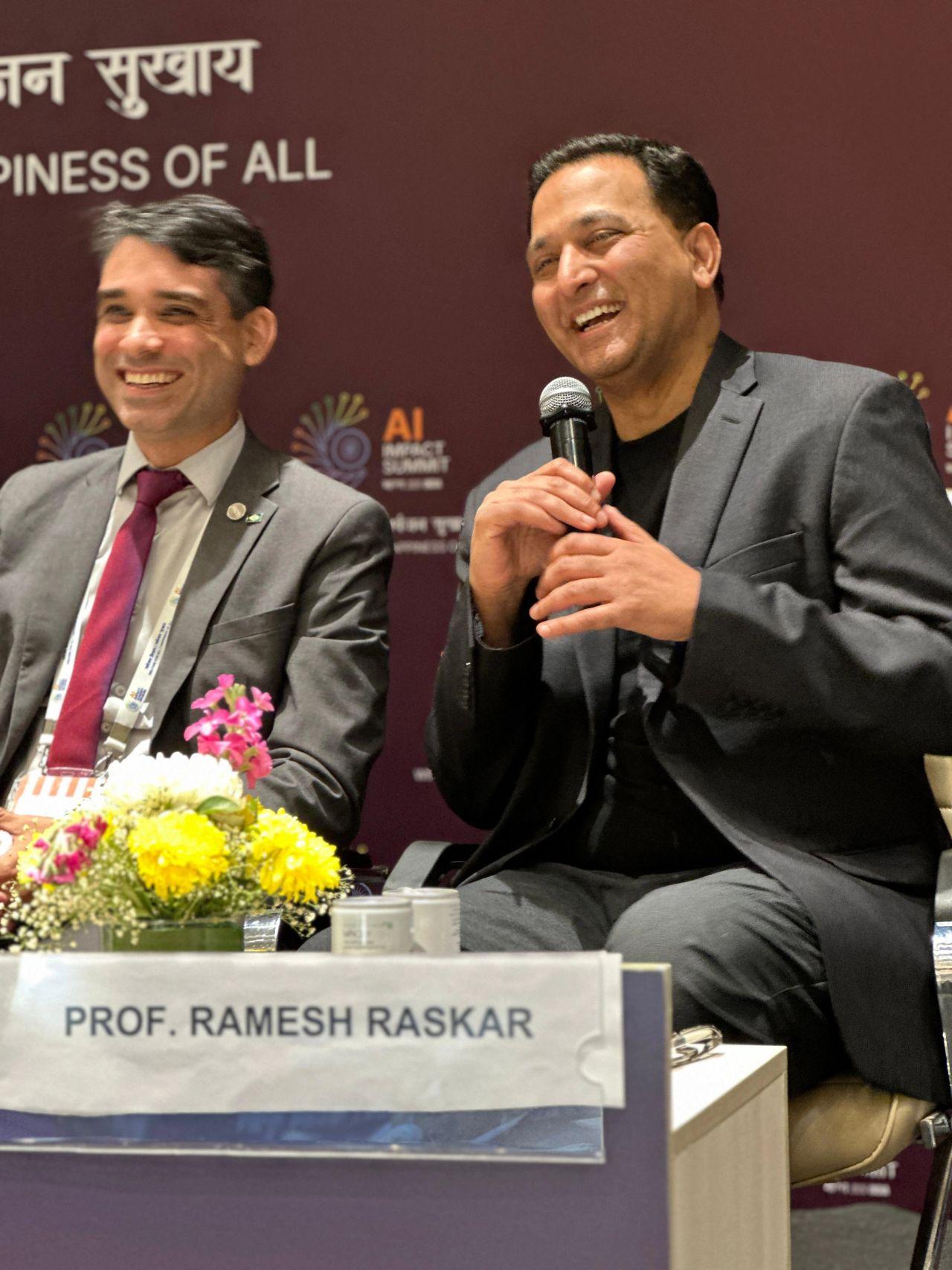 Project NANDA leader speaking onstage during a summit panel