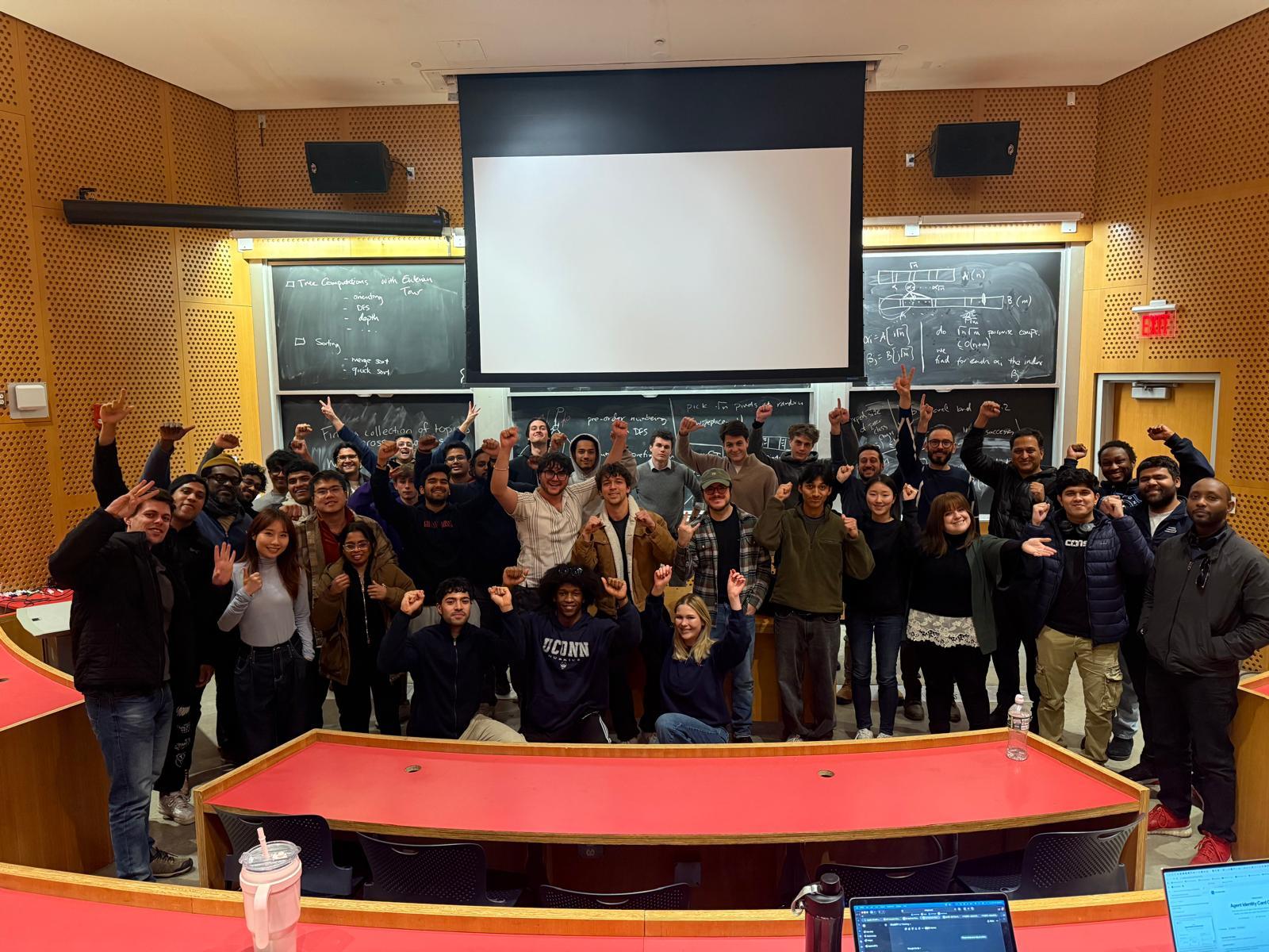 Project NANDA fellows celebrating together in a university lecture hall